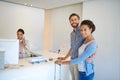 Its important for just the two of us to get away. a young couple checking in to a hotel. Royalty Free Stock Photo