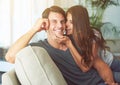 Its so important to make time for each other. an affectionate young couple enjoying their day at home together. Royalty Free Stock Photo