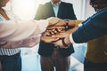 Its a matter of teamwork. Closeup shot of an unrecognizable group of businesspeople joining their hands together in a Royalty Free Stock Photo