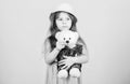 Its my toy. Small child cuddling teddy bear toy. Adorable girl child with cute stuffed animal doll. Little girl holding Royalty Free Stock Photo