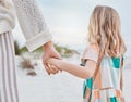 Its not about the gifts you give but the time you invest. a little girl spending the day at the beach with her mother. Royalty Free Stock Photo