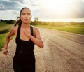 Its not about perfection, its about effort. a fit young woman power walking outside on a beautiful day. Royalty Free Stock Photo