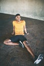 Its not too late to start feeling great. a young man taking a break after working out against an urban background. Royalty Free Stock Photo