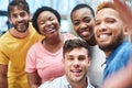 Its not a website without a meet the team page. a group of young businesspeople taking a selfie together in a modern Royalty Free Stock Photo