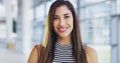 Its the perfect career for me. a confident young businesswoman walking through a modern office. Royalty Free Stock Photo