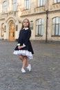 Its pleasure of elegance. Cute kid wear uniform outdoors. Back to school fashion. Fashion look of small girl. School