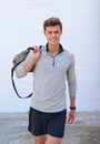 Its time for my gym session. a handsome young man holding his gym bag, ready for a workout. Royalty Free Stock Photo