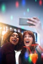 Its the weekend yeah. two young friends taking a selfie while having drinks at a party. Royalty Free Stock Photo