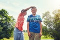 Its your turn to get wet. adorable young boys playing with water balloons outdoors. Royalty Free Stock Photo