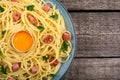 Itslian pasta carbonara with sausage and egg Royalty Free Stock Photo