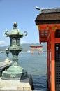 Itsukushima shrine, the Great torii in the background - Miyajima island Japan