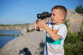 ittle boy holding binoculars Royalty Free Stock Photo