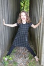 Ittle girl portrait have fun outdoor near garden wood hut Royalty Free Stock Photo