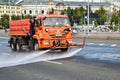 ÃÂ¡ity watering machine is watering the roadway Royalty Free Stock Photo