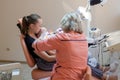Ivano-Frankivsk, Ukraine, August 26 2019: Mom and her little son visiting the dentist