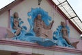 Neptune and mermaids. Bas-relief on old building, Ivano-Frankivsk, Ukraine