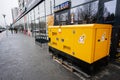 Ivano-Frankivsk, Ukraine - March, 2023: Yellow diesel generator on street