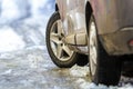 Ivano-Frankivsk, Ukraine - November 22, 2017: Close-up of car wheel in winter tire on snowy road Royalty Free Stock Photo