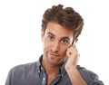 Ive been expecting your call...Portrait of a handsome young man talking on his cellphone. Royalty Free Stock Photo