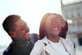 Ive got another surprise for you. a young man covering his girlfriends eyes outdoors. Royalty Free Stock Photo