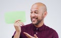 Ive got nothing more to say, its all there. a handsome young man holding a speech bubble against a grey background. Royalty Free Stock Photo