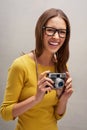 Ive got some great shots. Studio portrait of an attractive young female photographer posing with her camera against a Royalty Free Stock Photo