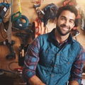 Ive got the tools to get the job done. Portrait of a man standing in his workshop. Royalty Free Stock Photo