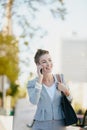 Ive just stepped out of the office for lunch. a young businesswoman talking on her cellphone while out in the city. Royalty Free Stock Photo