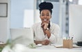 Ive never been more satisfied at work. a young businesswoman working at her desk in her office. Royalty Free Stock Photo