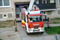 Iveco Eurocargo fire truck in action, some house in background. Royalty Free Stock Photo