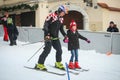 Ivica Kostelic teaching girl to ski