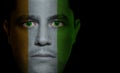 Ivorian Flag - Male Face Royalty Free Stock Photo