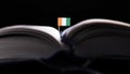 Ivorian flag in the middle of the book. Knowledge and education