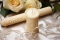 ivory-colored baptism candle with a wax seal Royalty Free Stock Photo