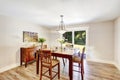 Ivory dining room with walkout patio