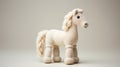Ivory Knitted Horse Toy: A Unique Blend Of Traditional Chinese And American Studio Craft Movement