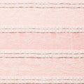 Ivory lace fabric on pink background