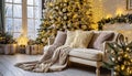 Ivory sofa with plush throw blanket near christmas tree. Hygge new year winter holiday home interior design of modern living room