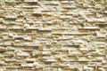 Ivory Split Face Stone in Random Pattern Wall as Background Royalty Free Stock Photo