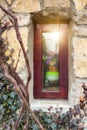 Ivy beautifully grows on the old stone house