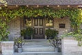 Ivy covered front door in upscale home Royalty Free Stock Photo