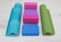 Iyengar yoga props blocks, strap, roller and carpet