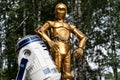 Izhevsk Russia 07.09.2018 Statues of robots from Star Wars movie, r2d2 and c3p0 outdoors