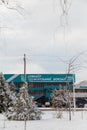 Izmail, Ukraine. February 2022. Building of maritime or river station in winter, some trees covered with snow, beautiful cityscape