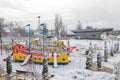 Izmail, Ukraine. February 2022. Navy war ship monument and bright playground in the shape of a ship covered with snow. Empty Royalty Free Stock Photo