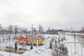 Izmail, Ukraine. February 2022. Navy war ship monument and bright playground in the shape of a ship covered with snow. Empty Royalty Free Stock Photo
