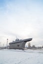 Izmail, Ukraine. February 2022. Navy war ship monument on the city street covered with snow. Besarabia winter landscape, vertical Royalty Free Stock Photo