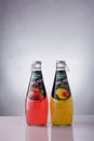 Freshness boom Basil seed drinks with strawberry and mango flavour. Bottles of sweet juice on white