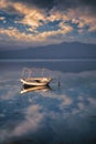 Izmir aliaga solo boat with clouds Royalty Free Stock Photo