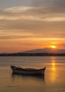 Izmir aliaga yenisakran bay sunset and a solo boat Royalty Free Stock Photo